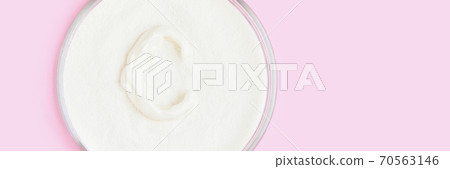 Collagen white powder. Pastel color background. Health product Collagen white powder. Pastel color background. Health product 70563146