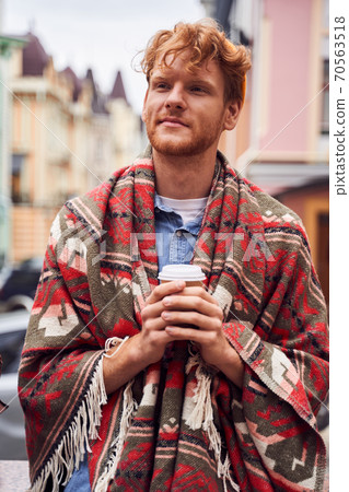 Cropped shot of handsome man drinking coffee 70563518