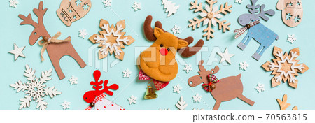 Top view of holiday decorations and toys on blue background. Christmas ornament Banner concept 70563815