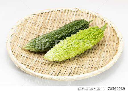 Bitter melon placed on a colander Bitter melon placed on a colander 70564089