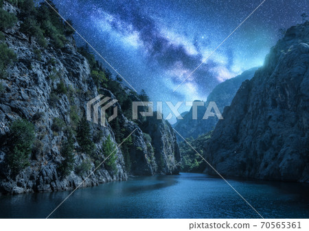 Milky Way over the beautiful mountain canyon and sea at night 70565361