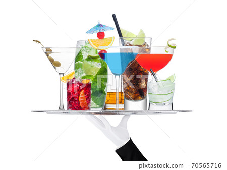 Batler waiter wearing white glove tray with cocktails 70565716
