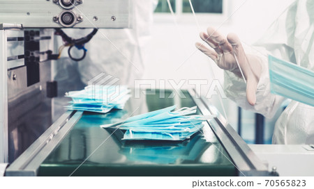 Face mask production line in modern factory Face mask production line in modern factory 70565823