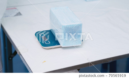 Face mask production line in modern factory Face mask production line in modern factory 70565919