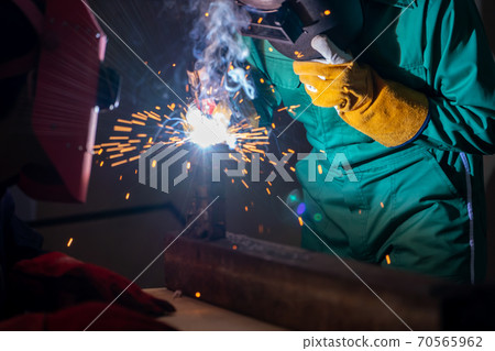 Metal welding steel works using electric arc welding machine Metal welding steel works using electric arc welding machine 70565962