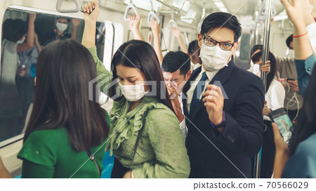 Sick man on train cough and make other people feel worry about virus spreading Sick man on train cough and make other people feel worry about virus spreading 70566029