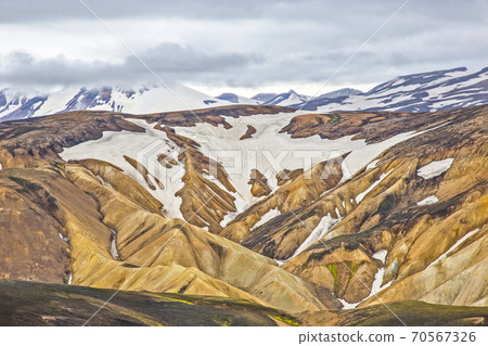 colored mountains of the volcanic landscape of Landmannalaugar. Iceland colored mountains of the volcanic landscape of Landmannalaugar. Iceland 70567326