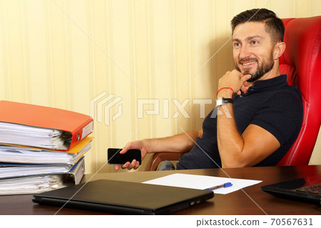 successful business man in the office 70567631