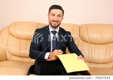 successful business man with business documents successful business man with business documents 70567634