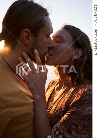 Man carrying his girlfriend 70567821