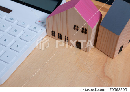 Family house dream concept, while buying a house for loved ones. Family house dream concept, while buying a house for loved ones. 70568805