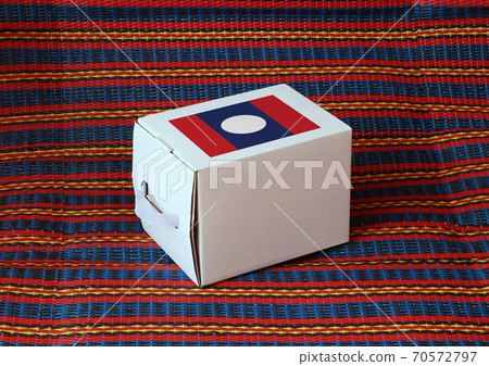 Lao flag on white box with stripe background, Paper packaging for put products. Lao flag on white box with stripe background, Paper packaging for put products. 70572797