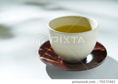 Tea in the shade of a tree Tea in the shade of a tree 70572983