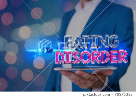 Handwriting text Eating Disorder. Concept meaning 70575382