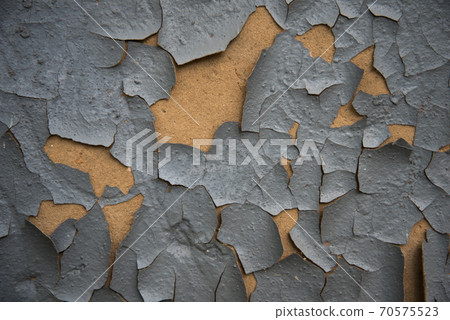 Cracked paint layer. Background, texture. Concept of aging and destruction Cracked paint layer. Background, texture. Concept of aging and destruction 70575523