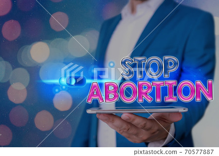Handwriting text Stop Abortion. Concept meaning Handwriting text Stop Abortion. Concept meaning 70577887