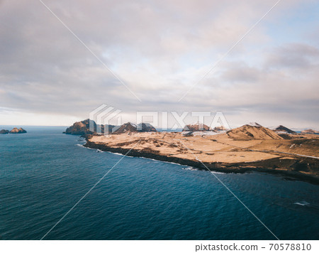 Sunny view of Helgafell volcano on Westman Islands Vestmannaeyjar 70578810