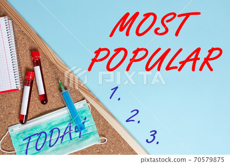 Conceptual hand writing showing Most Popular 70579875
