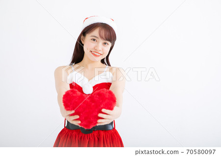 Woman cosplaying as santa 70580097