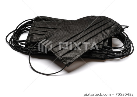 coronavirus COVID-19 pandemic concept - stack of antiviral surgical protective medical mask for protection against corona virus coronavirus COVID-19 pandemic concept - stack of antiviral surgical protective medical mask for protection against corona virus 70580482