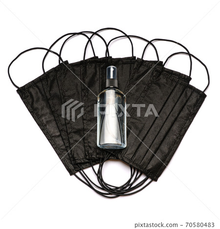 bottle of lotion, sanitizer or liquid soap and medical protective masks over light grey background bottle of lotion, sanitizer or liquid soap and medical protective masks over light grey background 70580483
