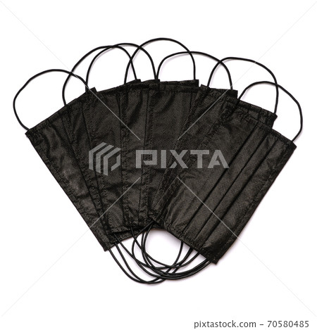 coronavirus COVID-19 pandemic concept - stack of antiviral surgical protective medical mask for protection against corona virus coronavirus COVID-19 pandemic concept - stack of antiviral surgical protective medical mask for protection against corona virus 70580485