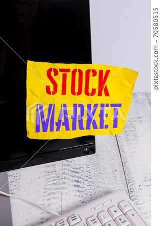 Writing note showing Stock Market. Business photo 70580515