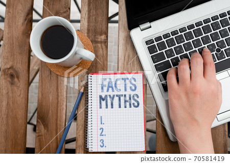 Conceptual hand writing showing Facts Myths 70581419