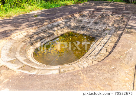 Huge Buddha footprints in the mountains in the deep forest of Nakhon Ratchasima, Thailand. 70582675