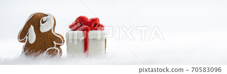 Gingerbread cookies rabbit and gift 70583096