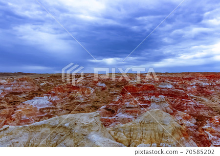 Unique landforms created by years of wind and water erosion at Wucaitan (Five Colored Hill aka Rainbow Beach) 70585202