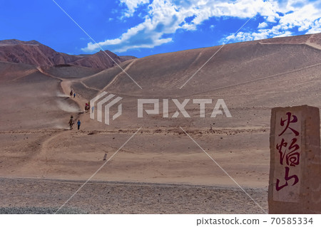 The Flaming Mountains is the northern route of the ancient Silk Road (Chinese translation - Flaming Mountain) The Flaming Mountains is the northern route of the ancient Silk Road (Chinese translation - Flaming Mountain) 70585334
