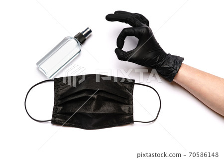 Human hand in protective glove and face protective masks isolated on white background Human hand in protective glove and face protective masks isolated on white background 70586148
