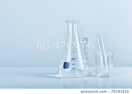 Group of scientific laboratory glassware with clear liquid solution, Science research 70593958