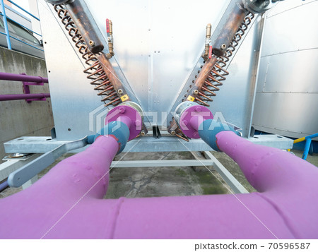 Pink pipes, valves and brass pipes of cooling system Pink pipes, valves and brass pipes of cooling system 70596587