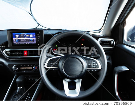 A photo of the driver's seat in the car A photo of the driver's seat in the car 70596869