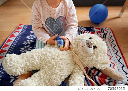 Beautiful with child play doctor at home. Child play doctor for healthcare design. Health care. Beautiful with child play doctor at home. Child play doctor for healthcare design. Health care. 70597015