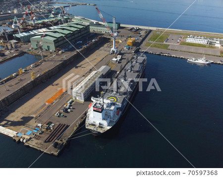 Aerial view of a ship repairing the Hakodate dock at Hakodate Port, Hakodate City, Hokkaido in autumn Aerial view of a ship repairing the Hakodate dock at Hakodate Port, Hakodate City, Hokkaido in autumn 70597368