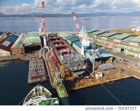 Aerial view of a ship repairing the Hakodate dock at Hakodate Port, Hakodate City, Hokkaido in autumn Aerial view of a ship repairing the Hakodate dock at Hakodate Port, Hakodate City, Hokkaido in autumn 70597377