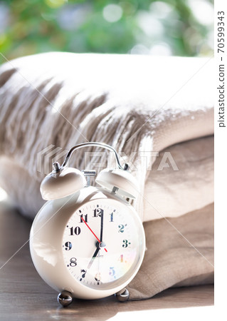 Alarm clock and bed linen Alarm clock and bed linen 70599343