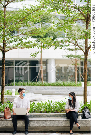 Working outdoors in masks 70603688