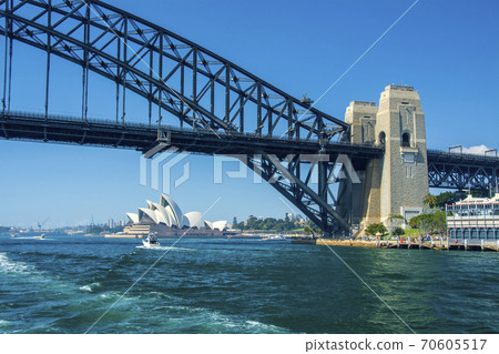 Sydney Harbor Bridge and Opera House seen from the sea 70605517