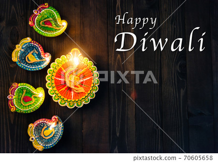 overhead clay lit light a fire already on Diya or oil lamp 70605658