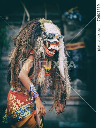 Dancer in traditional Balinese mask of demon Rangda Dancer in traditional Balinese mask of demon Rangda 70605819