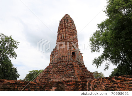The Main Phra Prang or pagoda in the ruins of ancient remains at Wat Worachet temple The Main Phra Prang or pagoda in the ruins of ancient remains at Wat Worachet temple 70608661