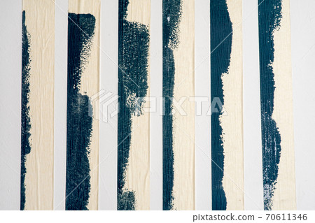 Strips of uses of masking tape along the edges of the paint Strips of uses of masking tape along the edges of the paint 70611346