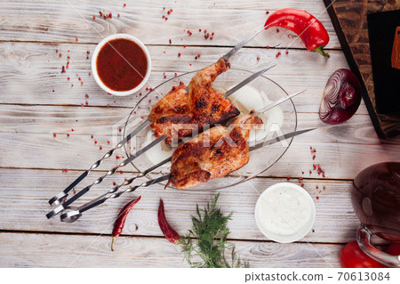 Top view on caucasian grilled chicken skewers Top view on caucasian grilled chicken skewers 70613084