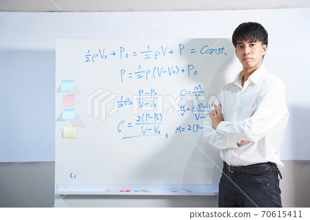 Cram school instructor, studying for entrance exam, preparatory school, cram school, cram school, exam, science guidance, whiteboard, mathematical formulas, mathematics 70615411