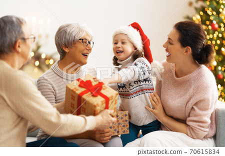 family celebrating Christmas family celebrating Christmas 70615834