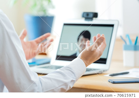 Men having an online meeting Men having an online meeting 70615971